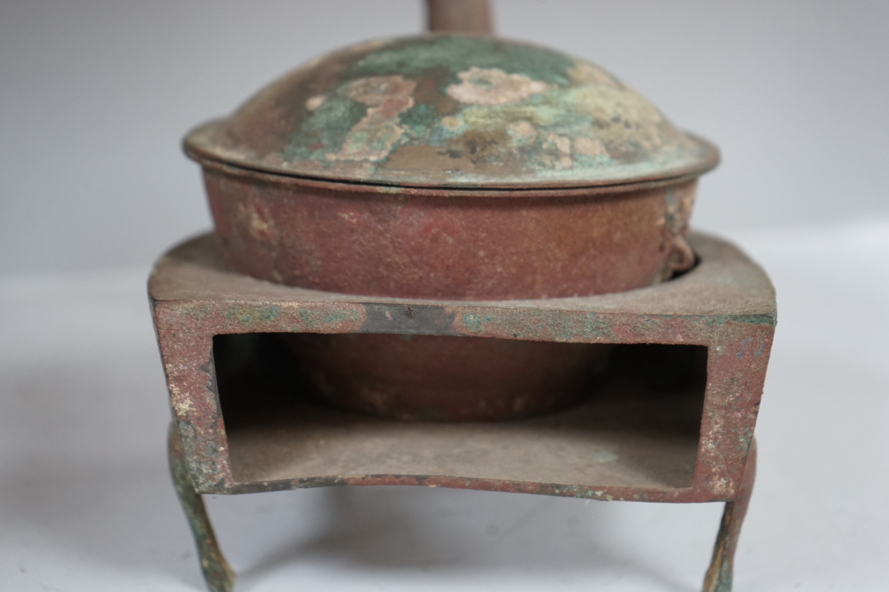 A Chinese bronze zoomorphic stove, Han Dynasty, 21cm long. Condition - fair